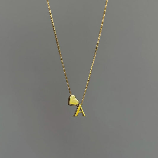 Initial with heart necklace