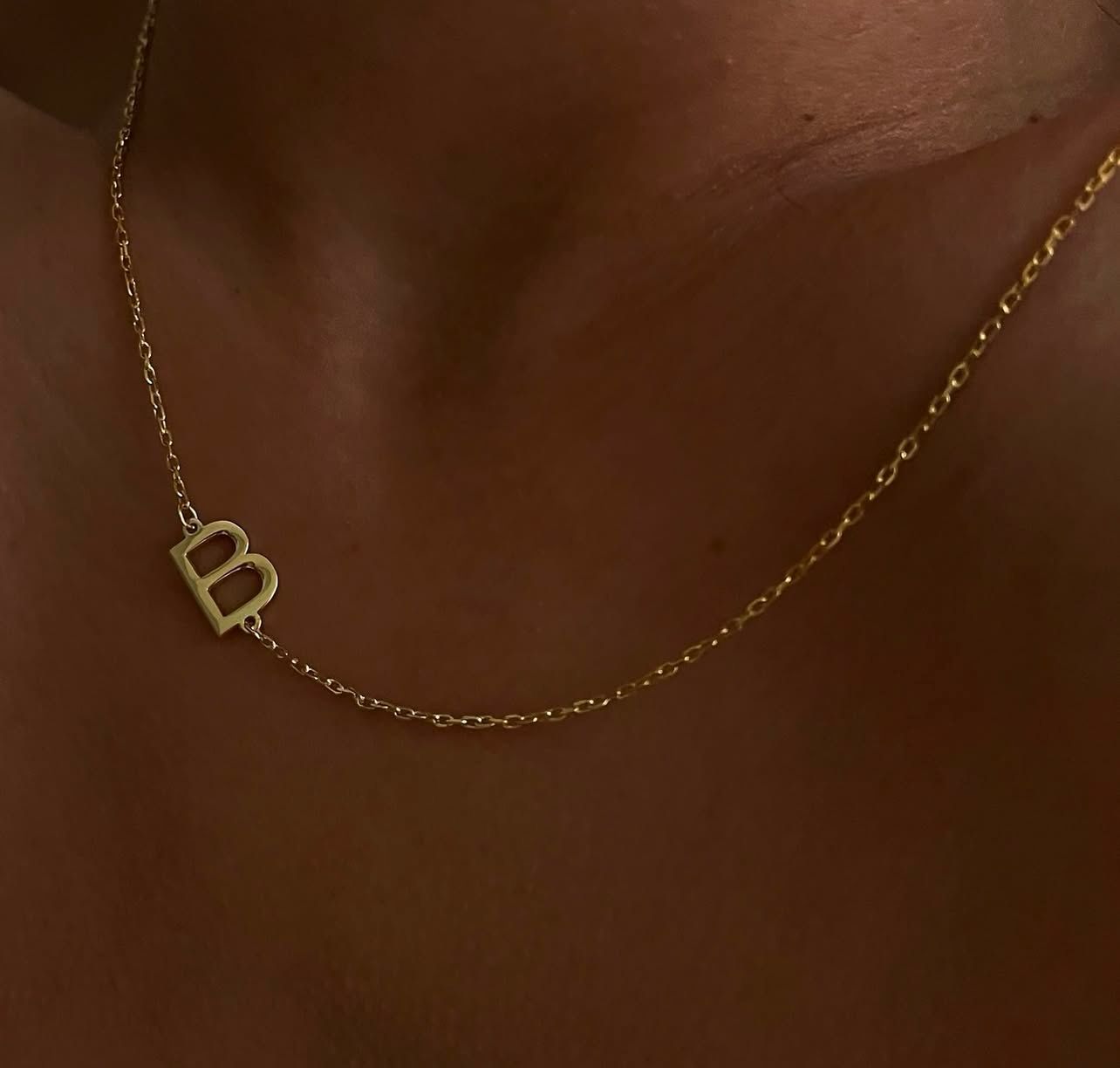 Basic letter necklace on side